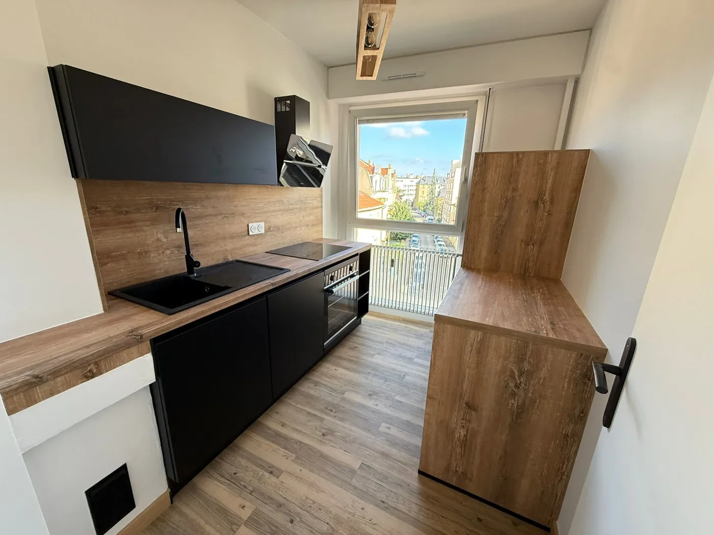 Cuisine rénovée par DNM Travaux, après travaux